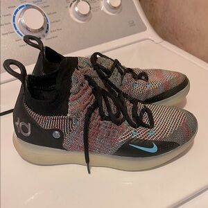 Nike Blue and Black Athletic Shoes with High-Top Design